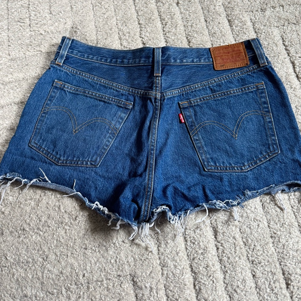 Levi's Women's Raw Hem Dark Blue Denim Cutoff Shorts